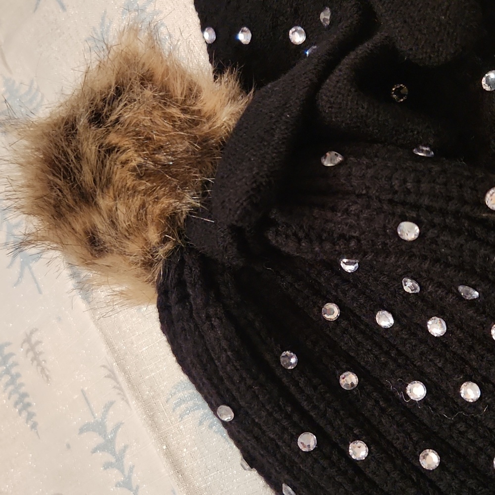 Knit hat and gloves adorned with rhinestones and hat has a furry ball on top!